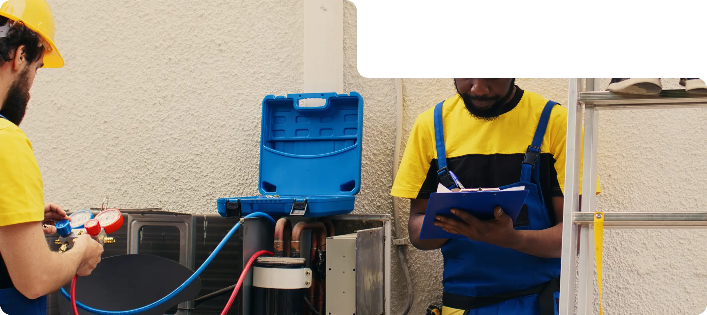 B and Z Heating & Air technicians collaborating on professional equipment maintenance and refrigerant servicing